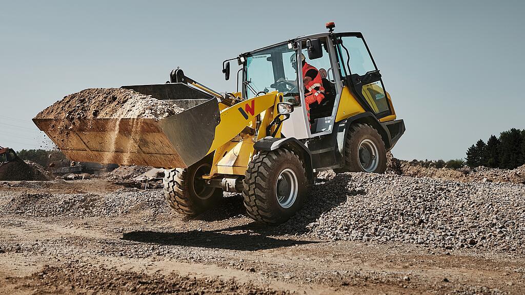 yellow wheel loader WL1150 in action