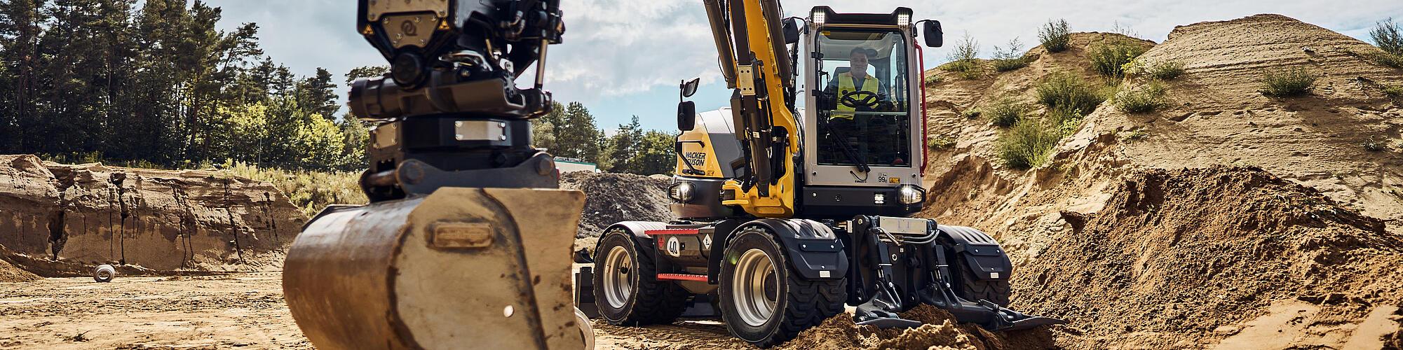 ew100 excavator in action