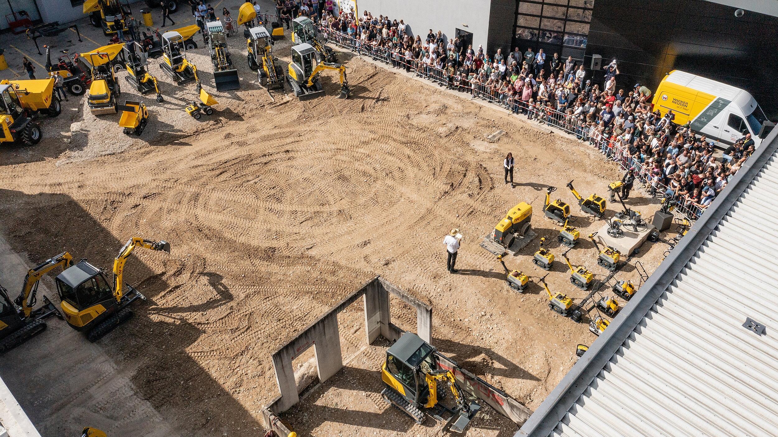 drone shot ofe demo show with construction equipment