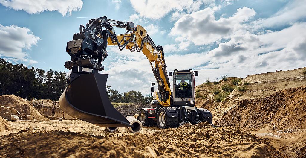 excavator EW100 in action