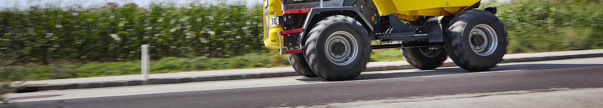 Dual View Dumper DV90 driving on a road.