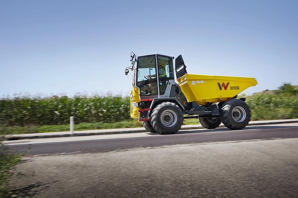 Dual View Dumper DV90 driving on a road.